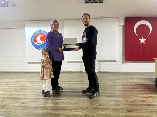 Certificate of Appreciation from Our College Director Assoc. Prof. Dr. Ahmet Biçer to the Academic Advisor of the “Yaşama Uzanan Eller Topluluğu” Lecturer Fulya Sağ Kara